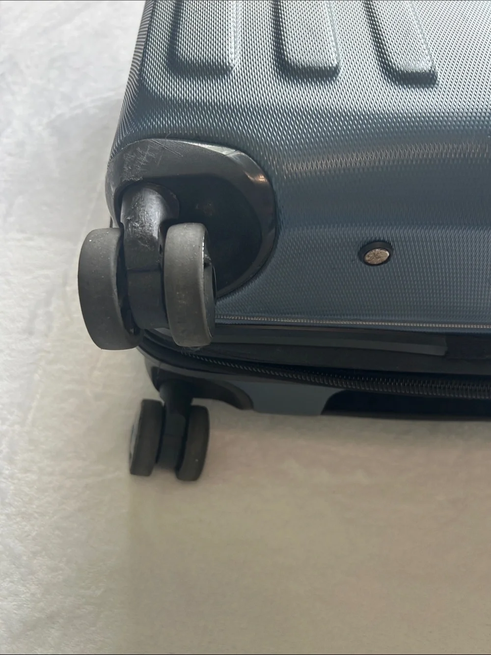 Ricardo Navy Blue Carry-On Spinner Luggage